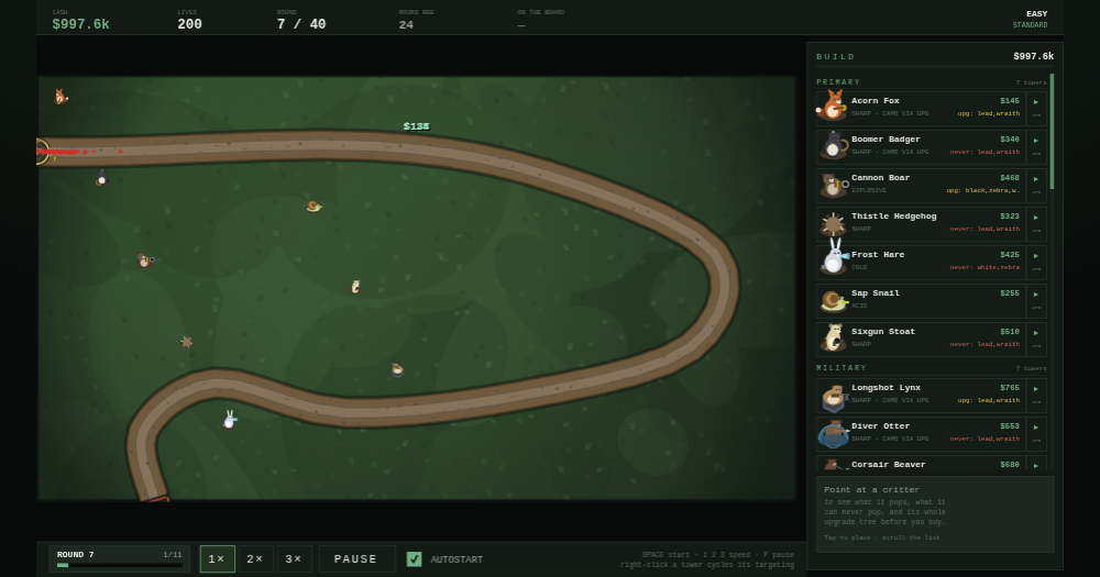 OVERPOP in play: critter towers along a winding track, with the tower shop and round HUD